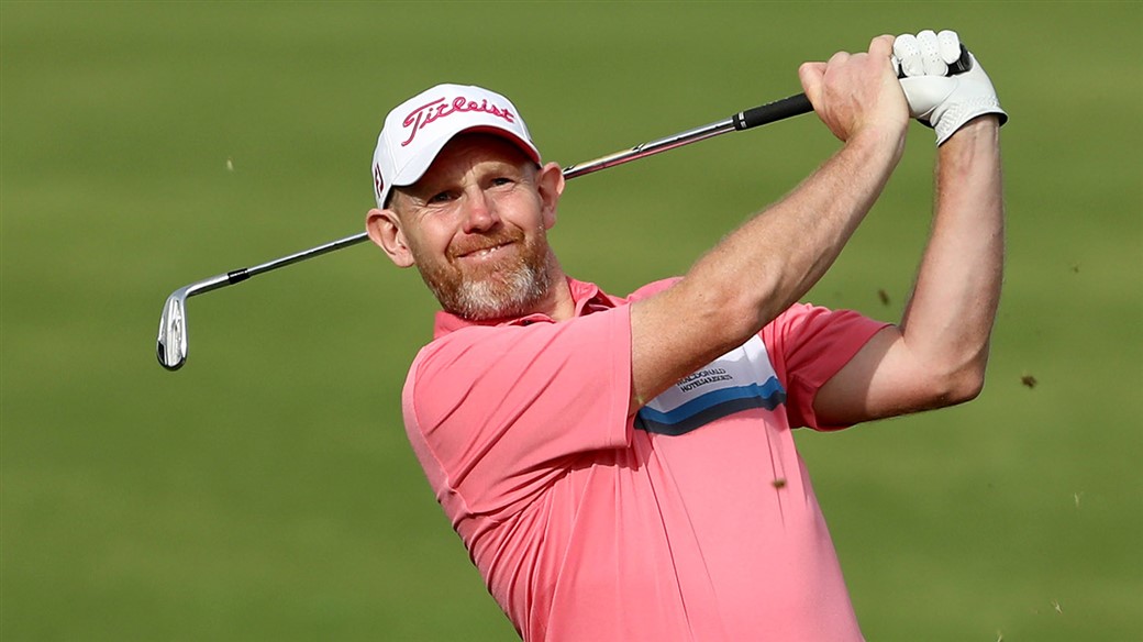Titleist player Stephen Gallacher hits an approach shot with a Titleist 718 AP2 iron